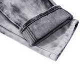 Men's Ripped Jeans With Sequined Skulls - TrendSettingFashions 