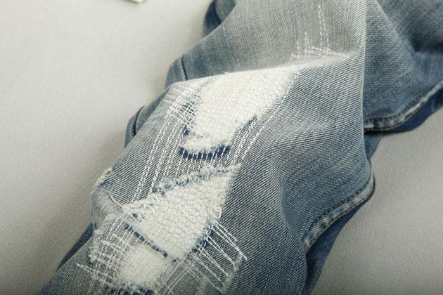 Men's Light Washed Ripped Grey Jeans - TrendSettingFashions 